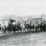 Iowas On Horseback in front of Nowlan's Restaurant, Guthrie I.T. 1889