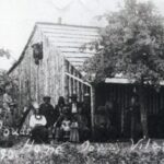Principle Men in front of White Cloud's home, Iowa Village 1890